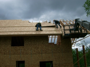Finishing the roof sheathing on the deck overhang